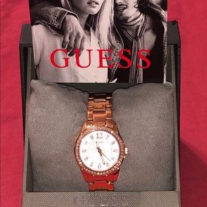 Women’s rose gold Guess watch